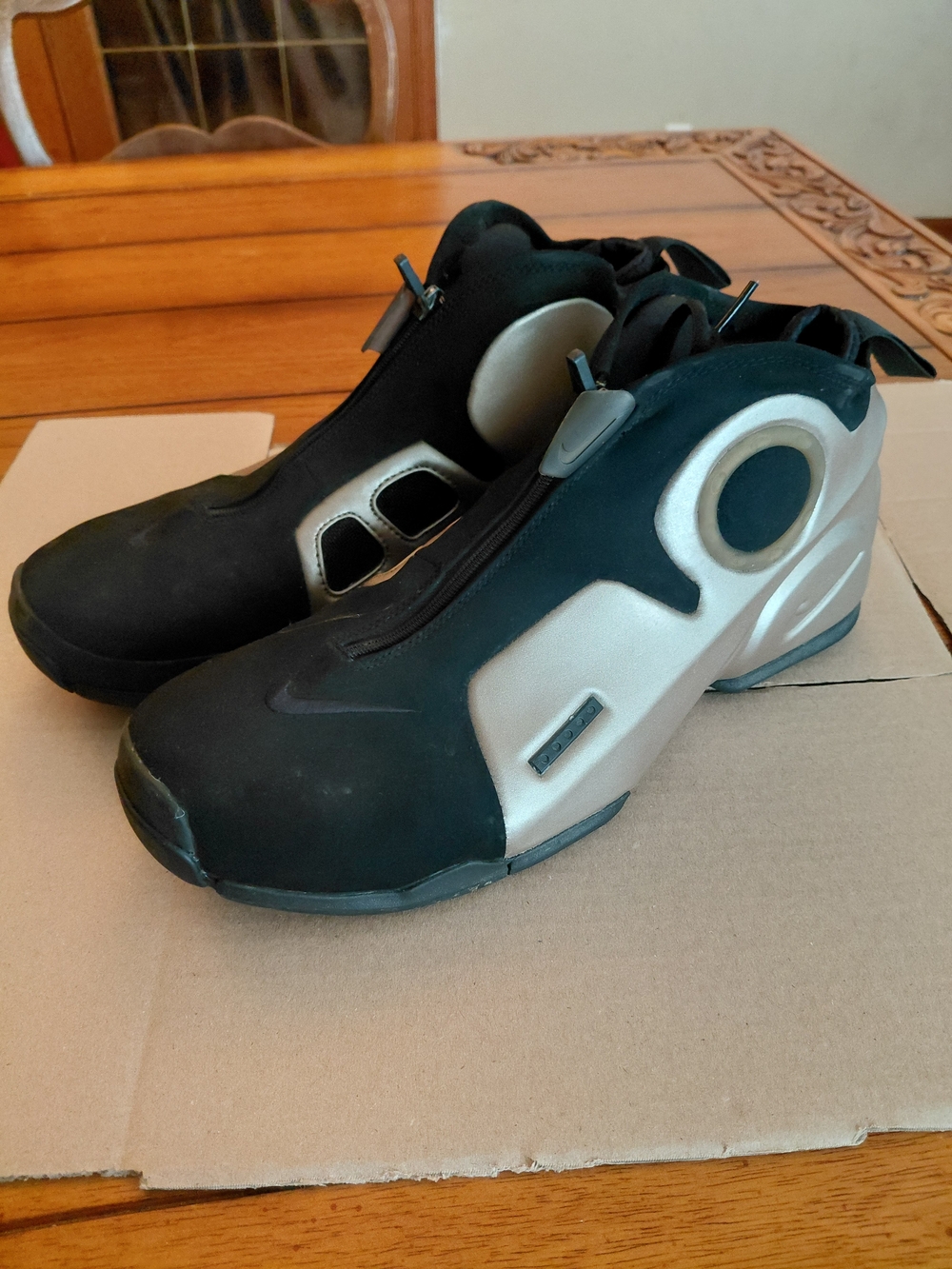 Nike Men’s Black and Silver Athletic Sneakers with Zipper Closure